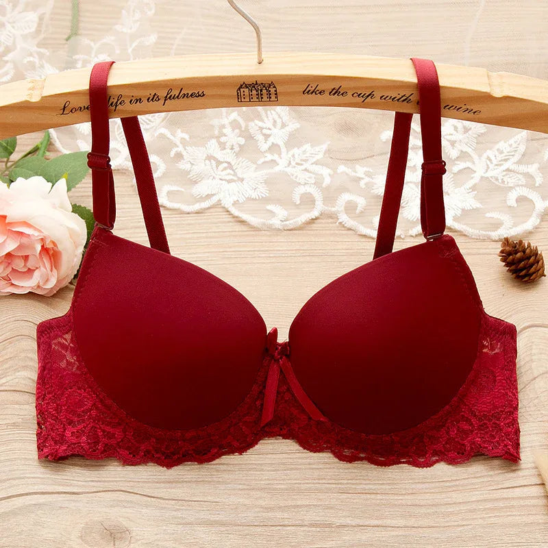 Underwire gathered bra in deep red with lace trim and front bow detail