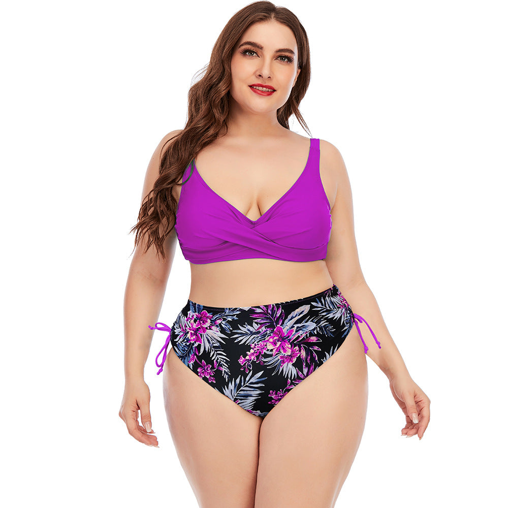 Two-piece swimwear set with purple V-neck bikini top and purple floral leaf print high-rise bottoms