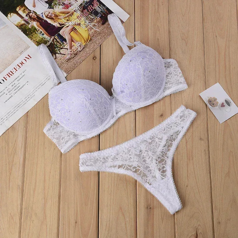 White lace thong bra set with underwire cups and matching lace thong