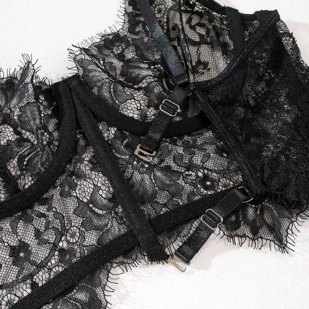 Black garter waistband with lace trim and adjustable buckle straps