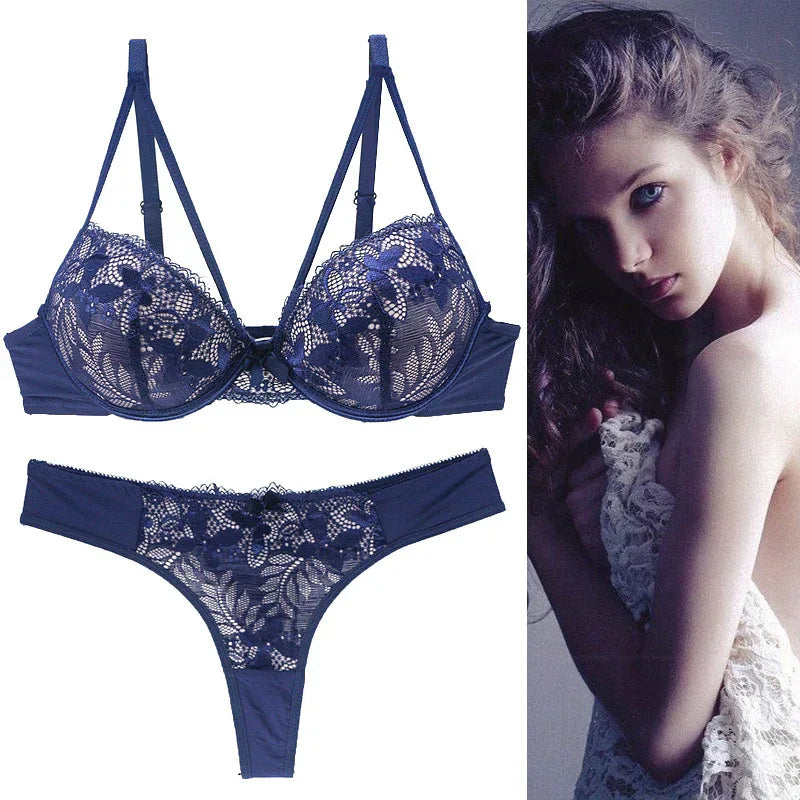 Dark blue lace push-up bra and matching thong set with underwire cups