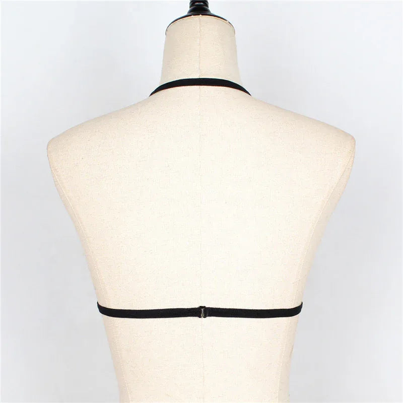 Back view: black lace halter bra with center tie strap closure
