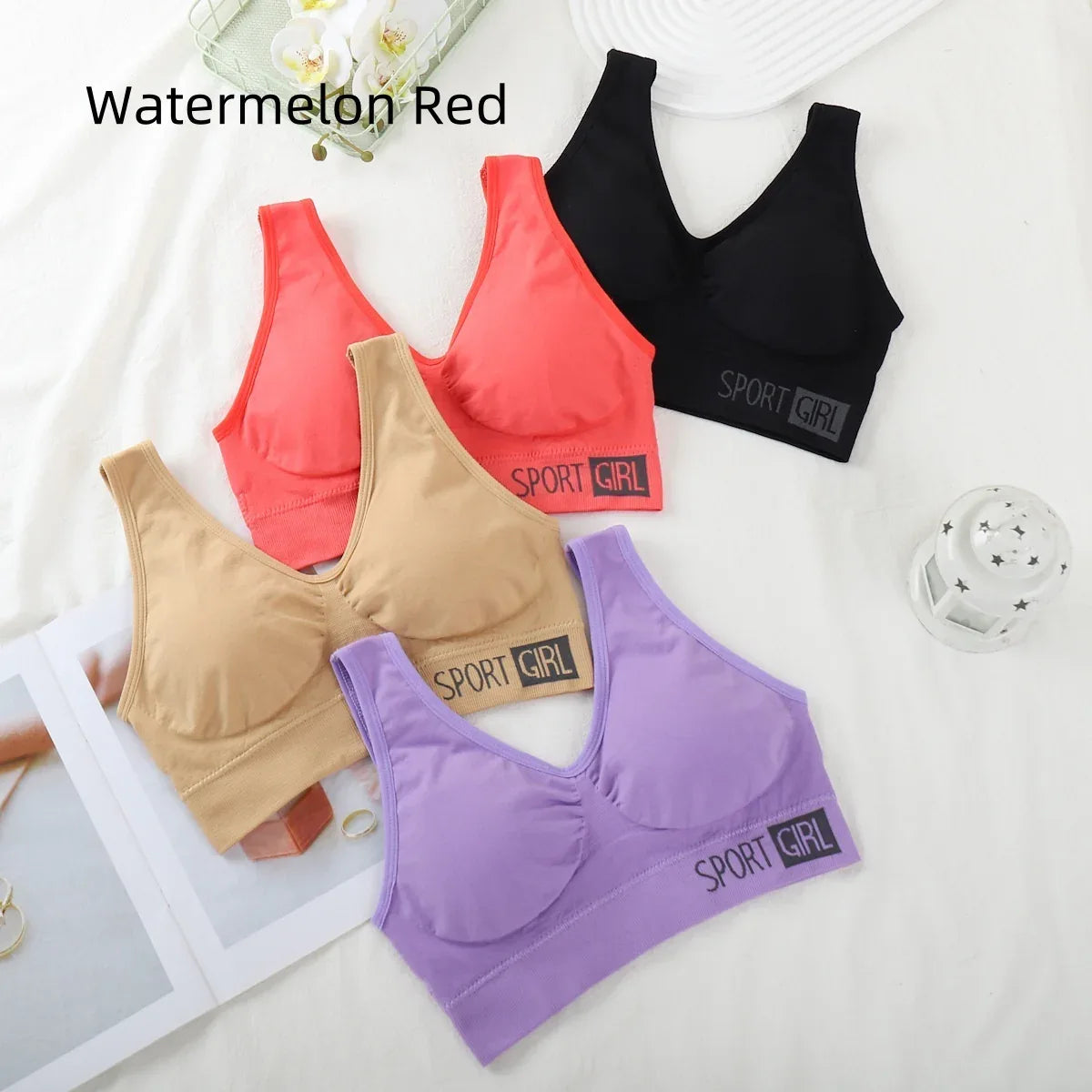Wire-free sports bra set in watermelon red with black, skin tone, and purple