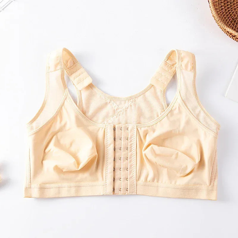 Apricot front-closure sports bra, laid flat