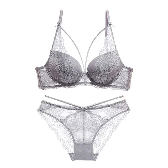 Light gray push-up bra and lace briefs set with lace overlay and bow center