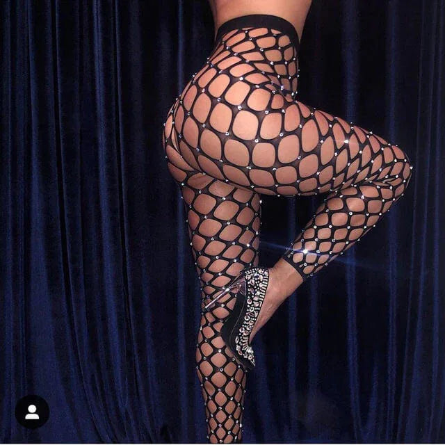 Black big-net fishnet stockings with large oval holes and rhinestone garter strap