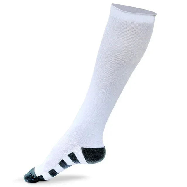 White compression socks to calf, black toe/heel with striped arch