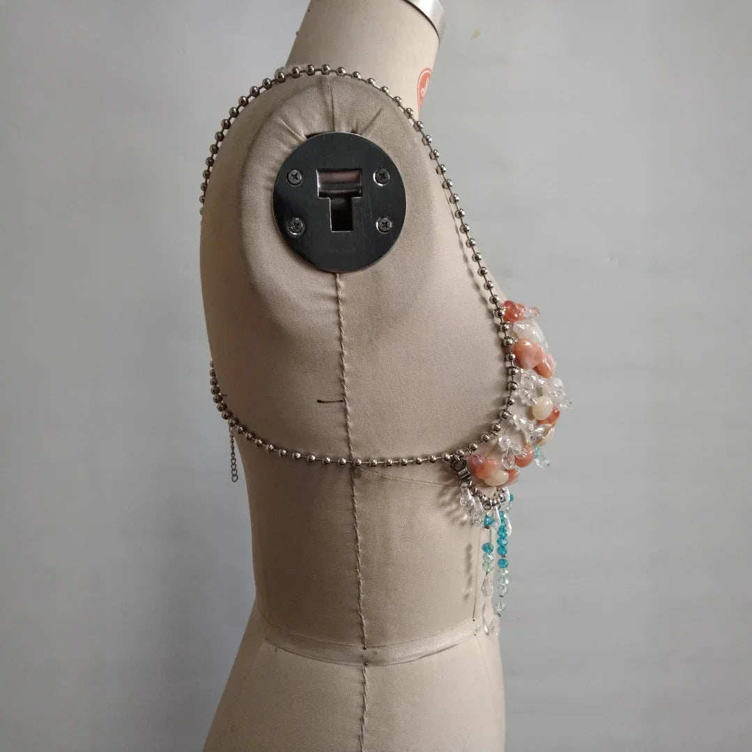 Side view of halter body chain with bead clusters and blue tassel drops