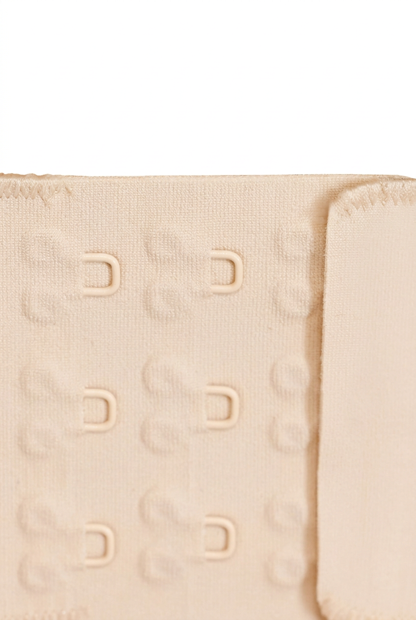 Beige underwired bra back closure with multiple hook-and-eye positions