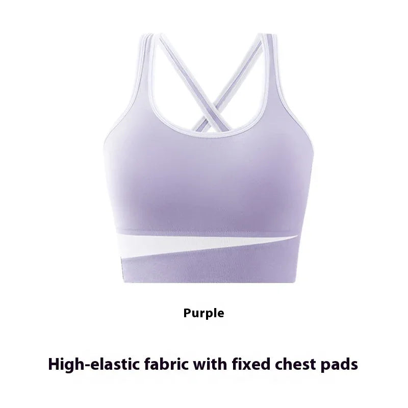 Purple wire-free sports bra with crisscross straps and white contrast trim