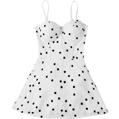 White one-piece swimsuit with black square print, underwire bodice and flared skirt