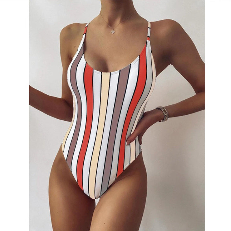 Multicolor striped one-piece swimsuit with white, red, and blue vertical stripes