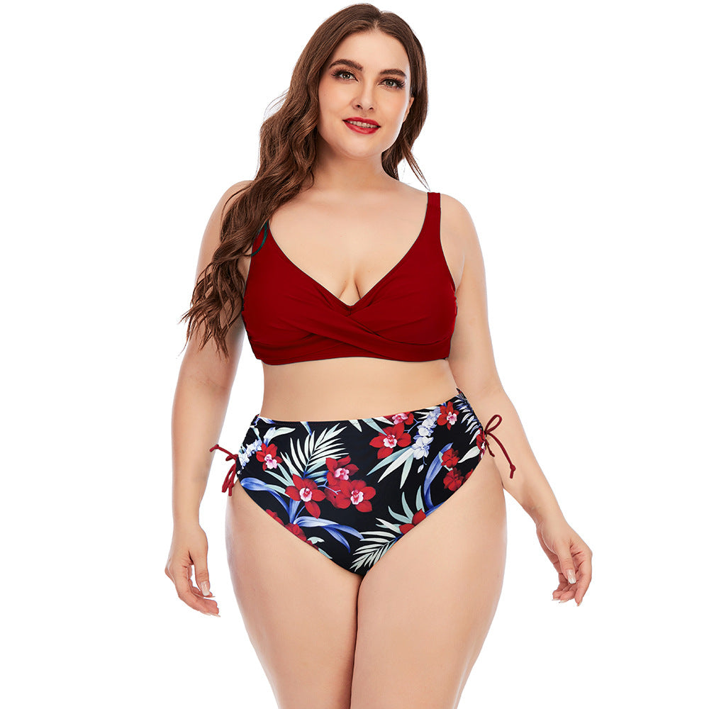 Two-piece swimwear set with red V-neck bikini top and floral print high-rise bottoms