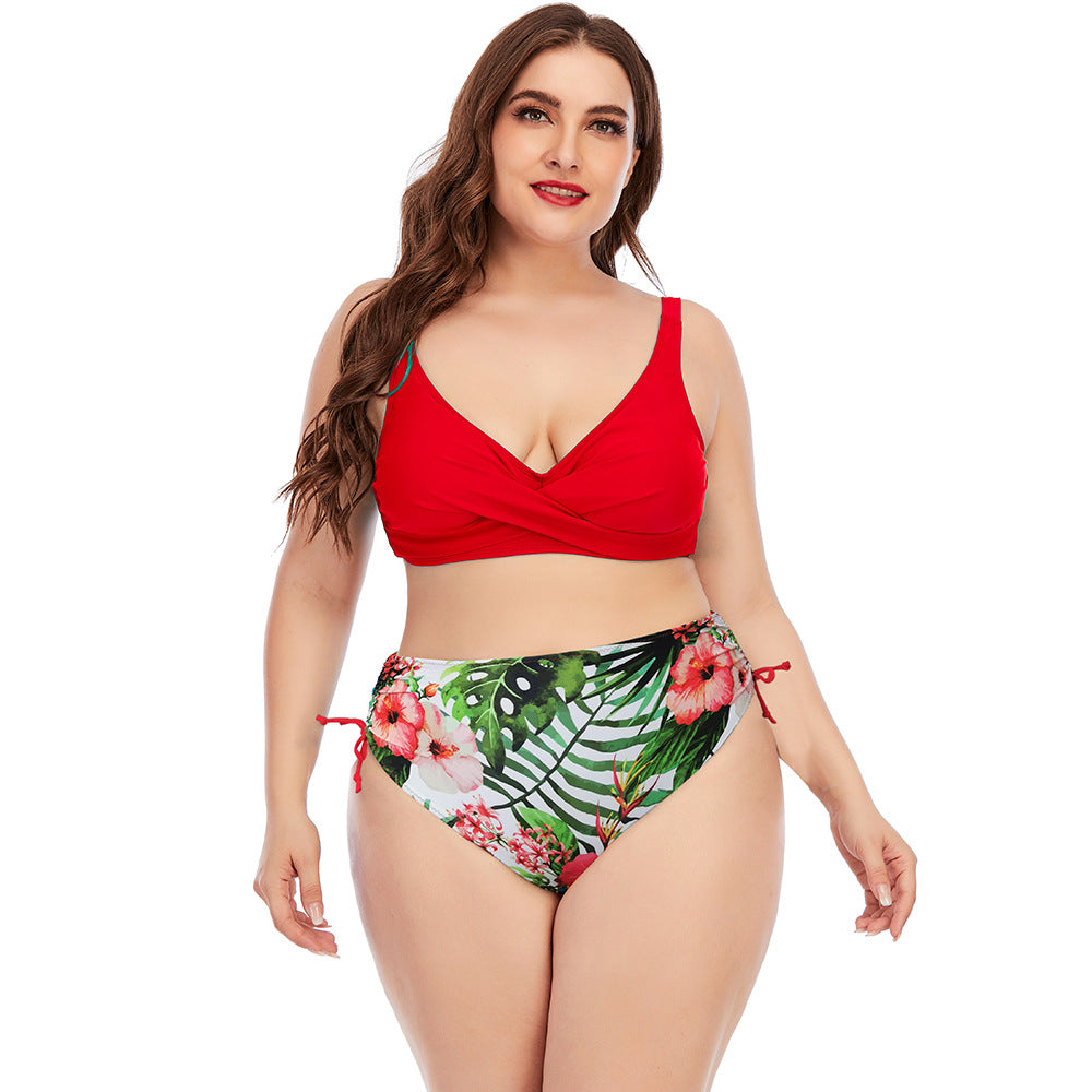 Two-piece swimwear set with red V-neck bikini top and floral high-rise bottoms