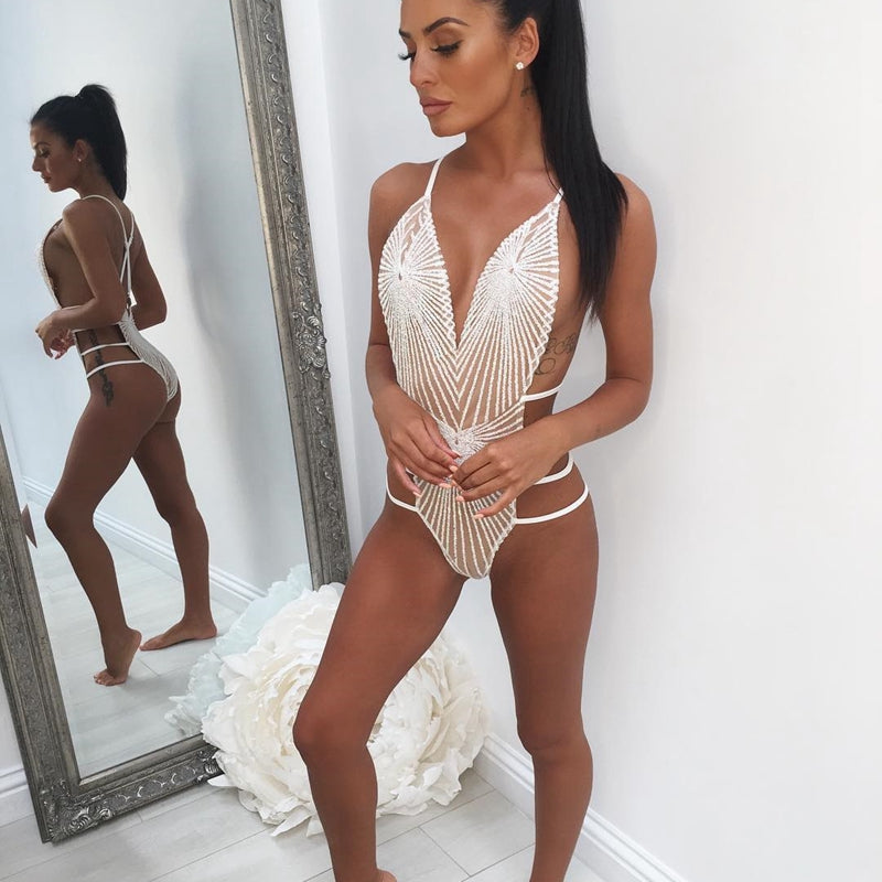 White glitter monokini one-piece with deep V neckline and halter straps