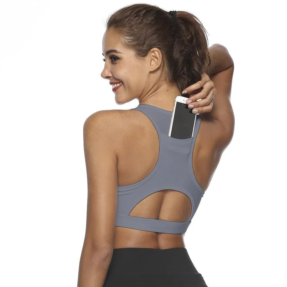 Women’s sports bra in gray, racerback with back oval ventilation cutout