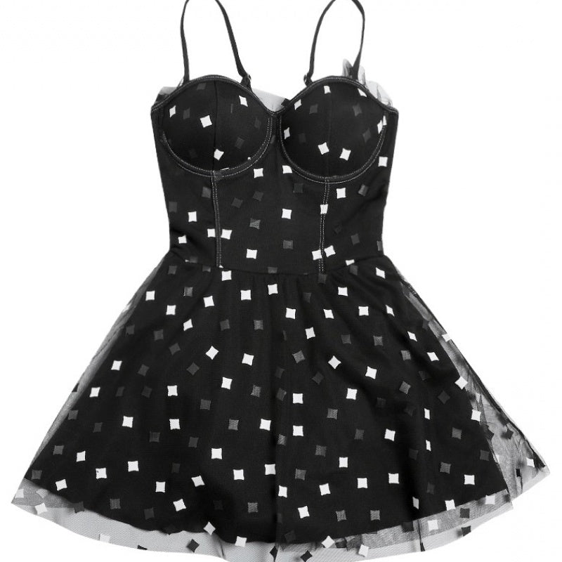 Black one-piece swimsuit with white square print, underwire bodice and flared tulle skirt