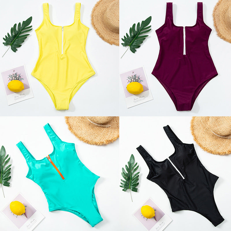 Zip-front one-piece swimsuit, four colors shown: yellow, burgundy, teal, black