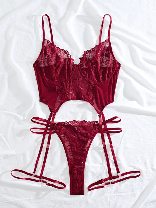 Front flat lay: purplish red lace bra with underwire, lace brief, garter set