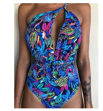 Backless monokini swimsuit with colorful tropical feather print and deep V neckline