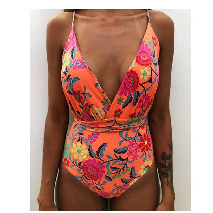 Backless monokini swimsuit with orange and pink floral print and V neckline