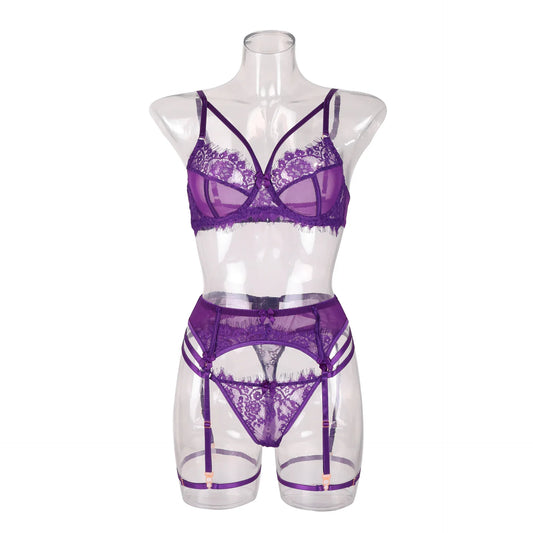 Purple lace lingerie set on clear mannequin: bra, high-rise bottoms, garter straps