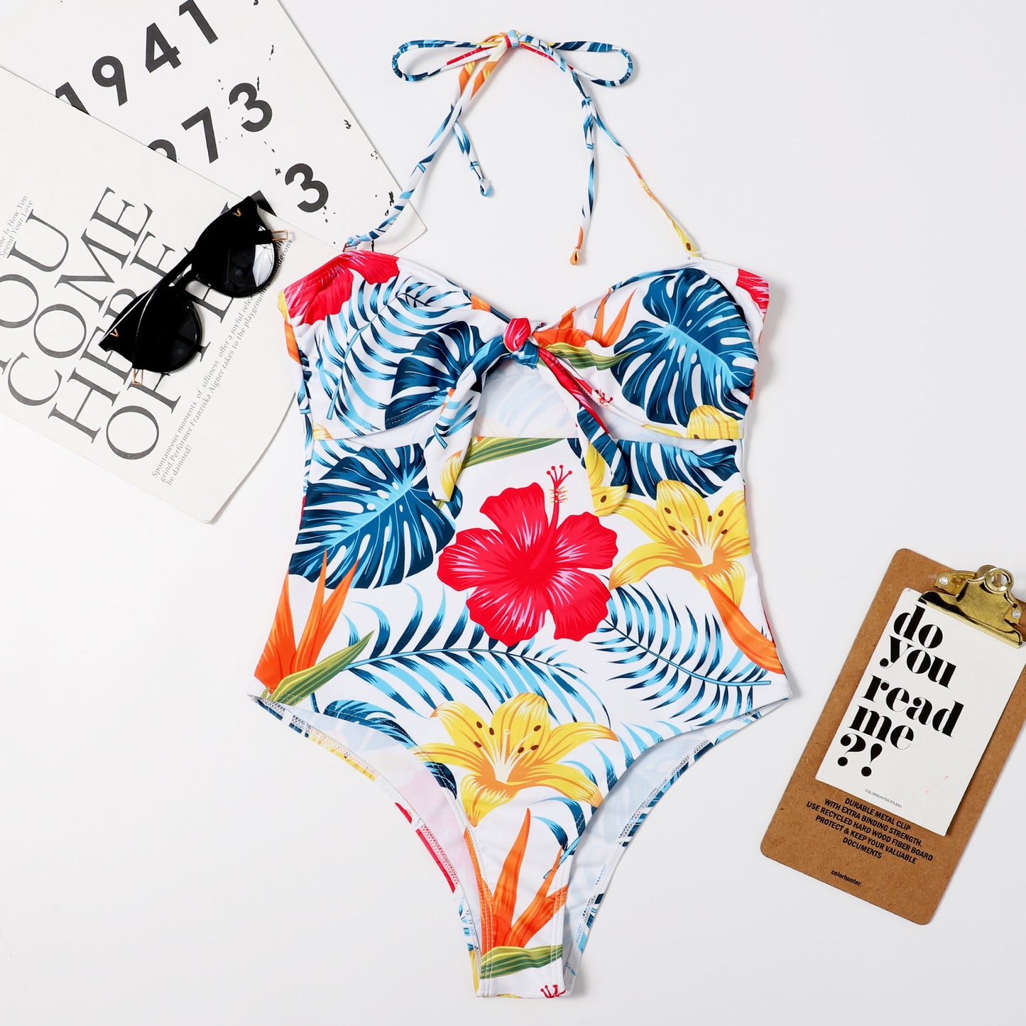 Tropical-print bandeau one-piece swimsuit with front bow-tie cutout