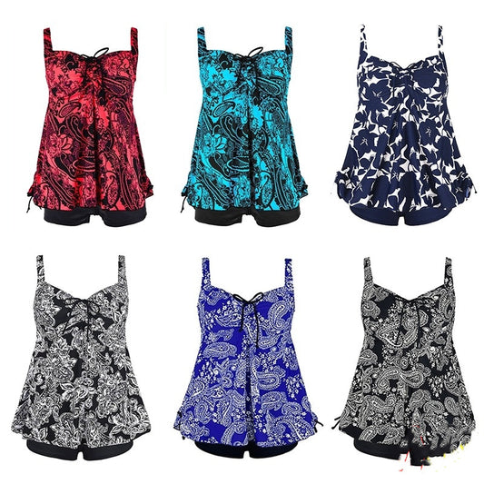 Plus size two-piece swim set in red and black paisley print, scoop neckline and skirted shorts