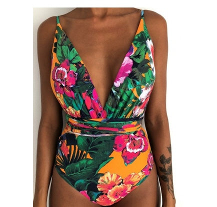 Backless one-piece monokini with colorful floral print, deep V-neck and tie waist