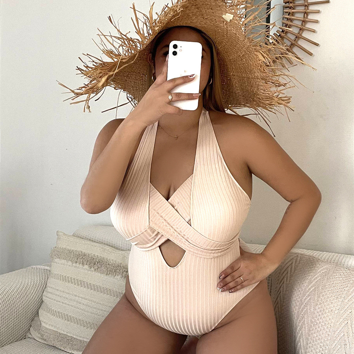 Beige ribbed halter one-piece swimsuit with front overlap and center cutout