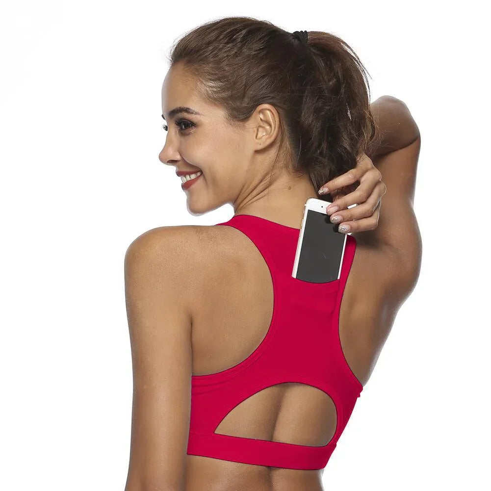 Women’s sports bra in red, back view with large oval cutout