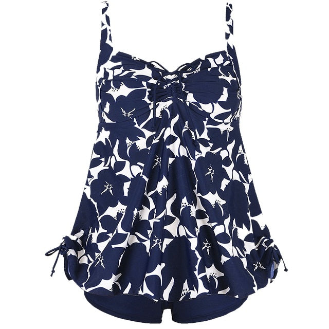 Plus size two-piece swim set in navy and white cat print, tie-front tank with ruffled skirted hem