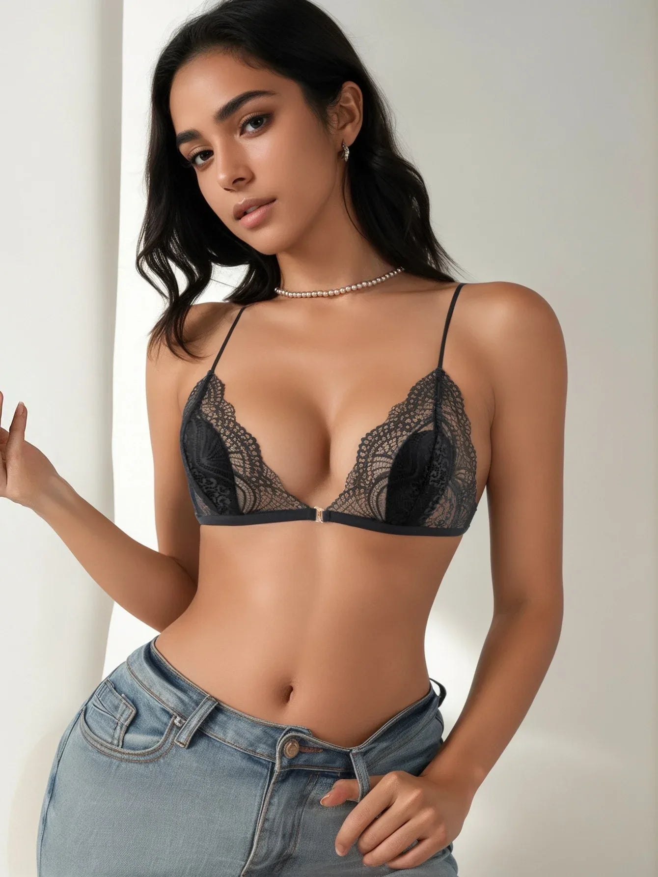 Black lace lingerie set triangle bra with thin straps and lace cups, front view