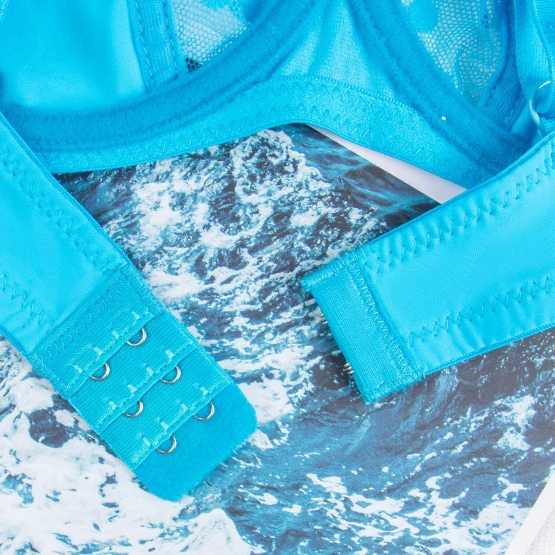 Blue polka-dot lingerie bra extender with multiple hook-and-eye rows