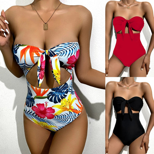 Bandeau one-piece swimsuit in tropical print with strapless back and bow-tie detail